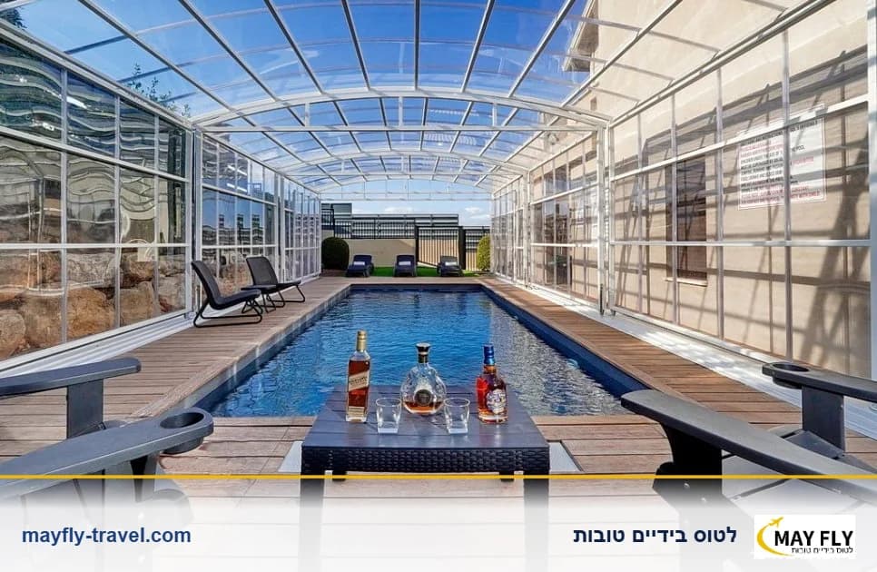 אחוזת נוף מרגליות בגליל עליון עם בריכה מחוממת ומקורה